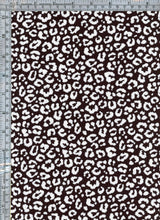 Fabric Wholesale Depot CHEETAH PRINTED ON SOFT POLYESTER SPANDEX 4X2 RIB NF00952-026.